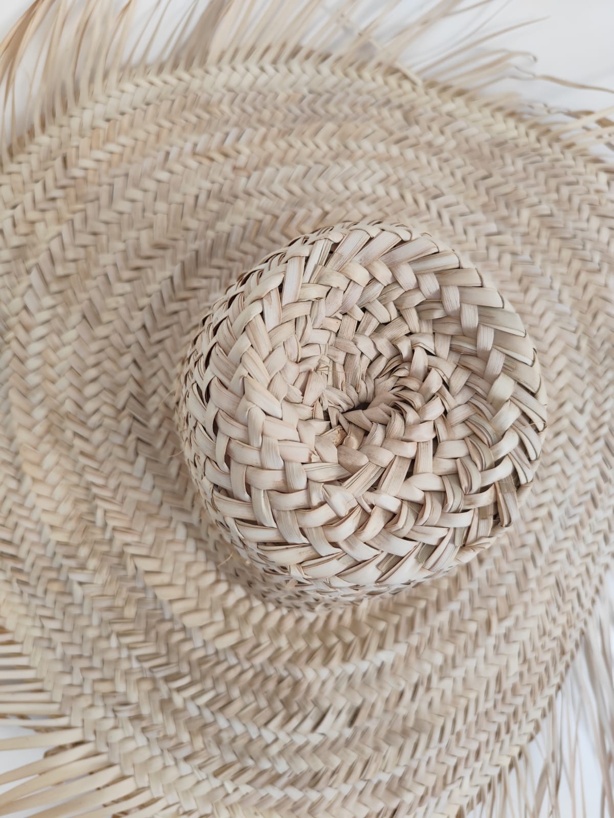 Chapeau mural en feuille de palmier